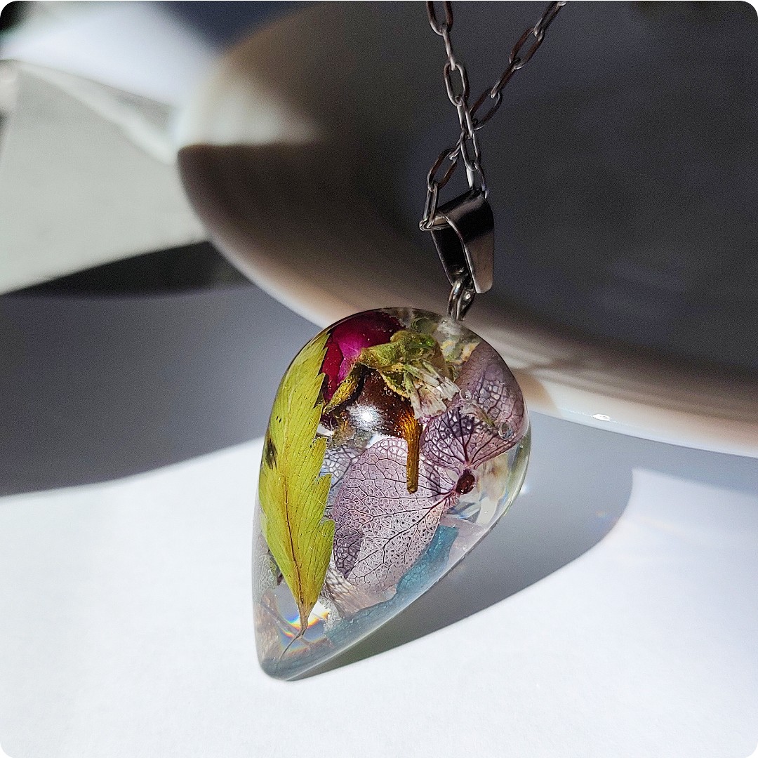 Naszyjnik wahadełko z kwiatami - obrazek 4