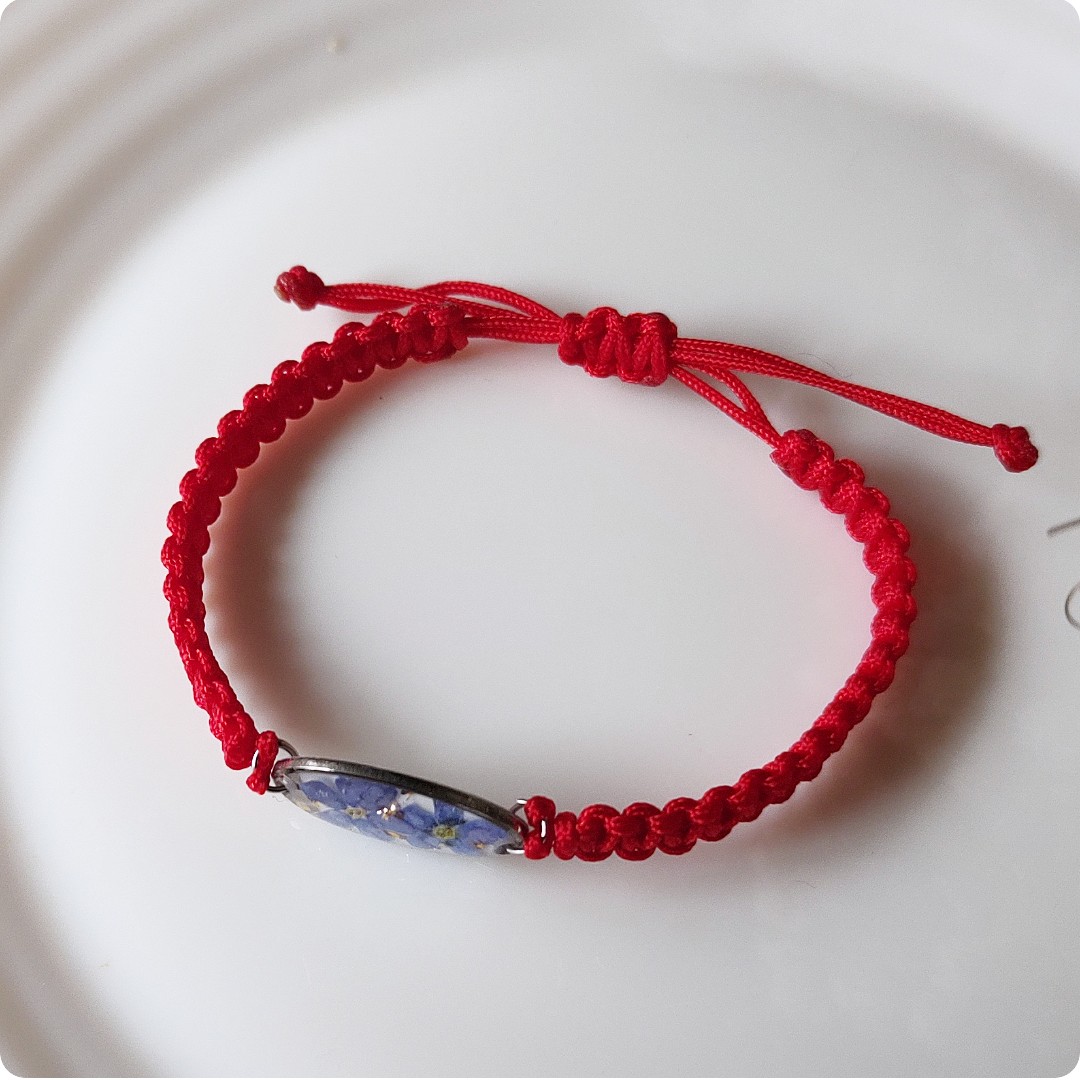 Regulowana bransoletka z niezapominajkami - obrazek 4